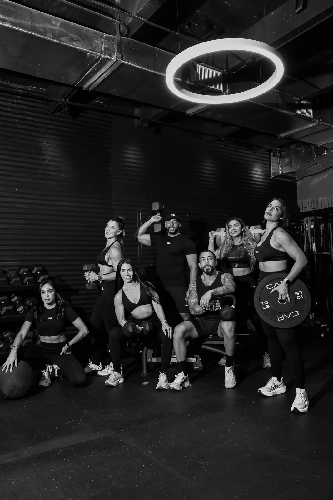 Athletes gathered in a gym.