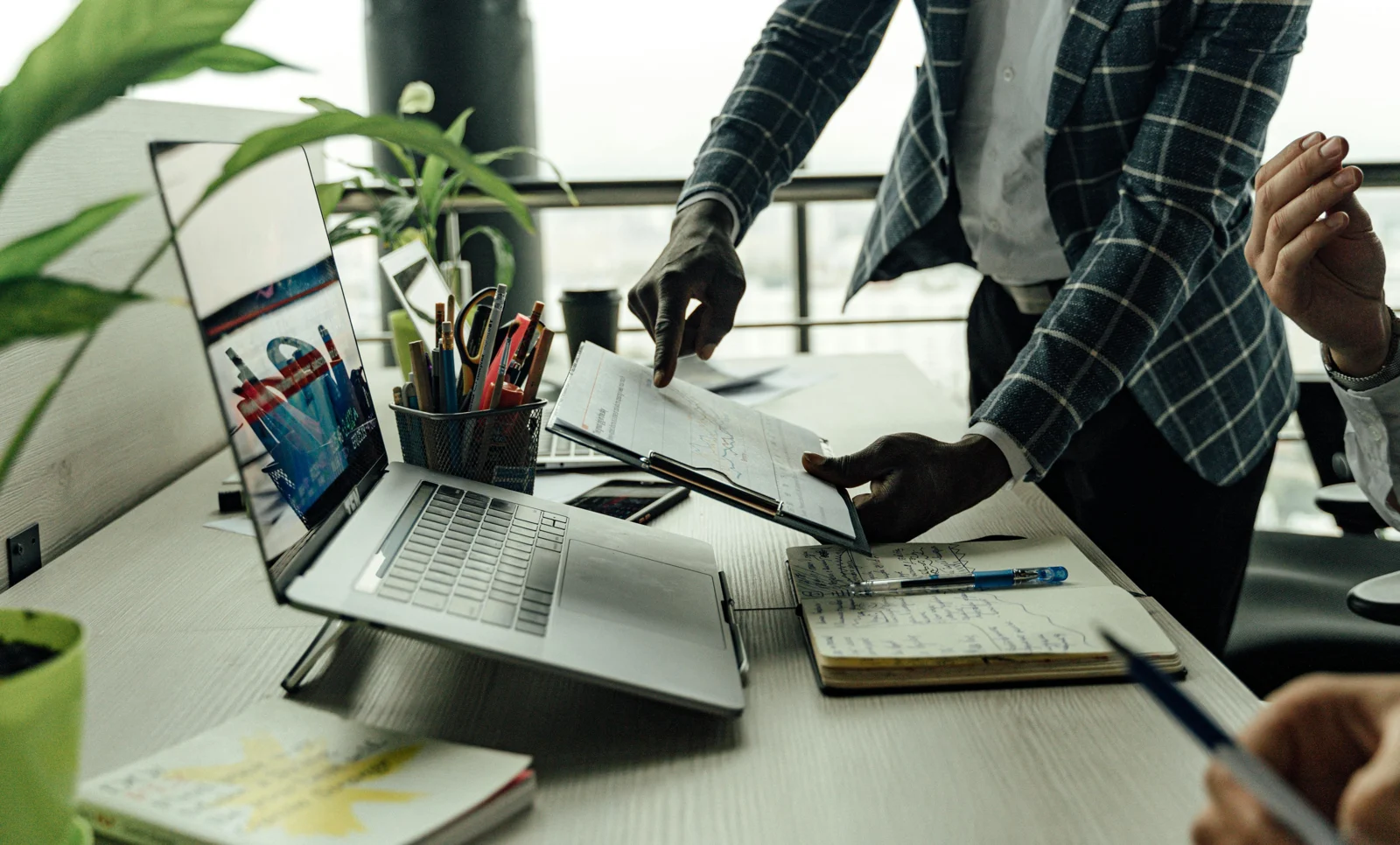 A workspace with a laptop and equipment.